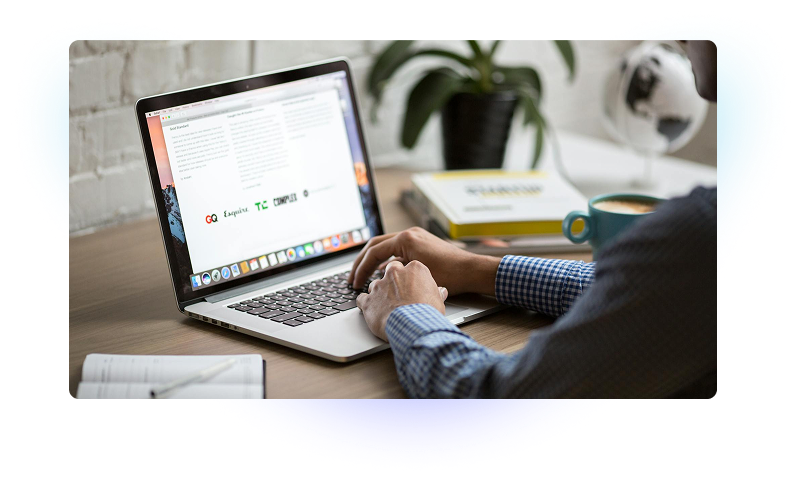 Person working on laptop with email platform