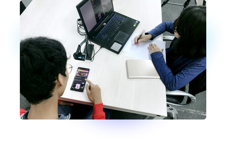 Person working on laptop with email platform